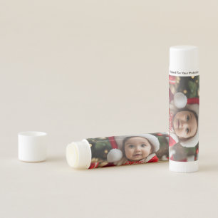 Adorable Baby in Santa Outfit with Christmas Lip Balm