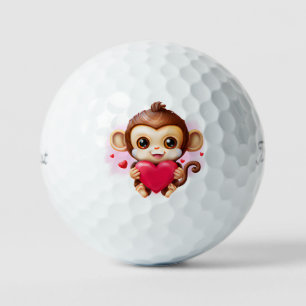 Adorable Baby Monkey Holding a Red Heart Golf Balls