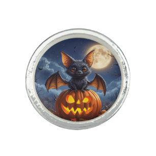 Adorable Cartoon Bat Perched on Jack-o'-Lantern Ring