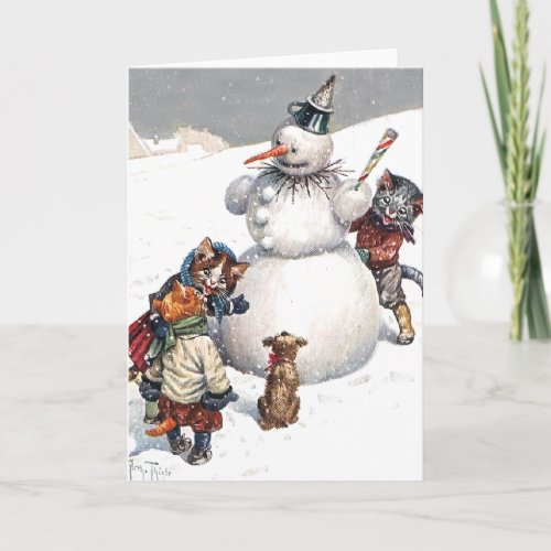 Adorable Cats Building a Snowman Holiday Card