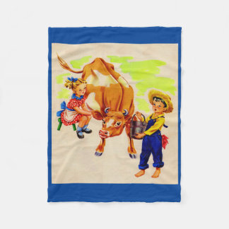 adorable children with adorable cow fleece blanket
