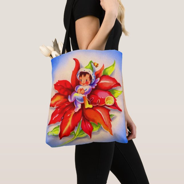 adorable Christmas elf in a poinsettia print Tote Bag (Close Up)