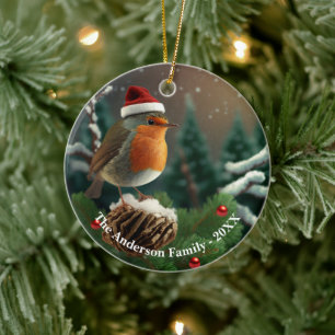 Adorable custom robin over a snow-covered tree ceramic ornament