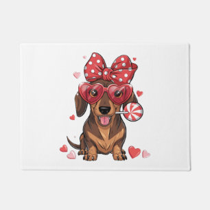 Adorable Dachshund In Heart Glasses And Polka Dot Doormat