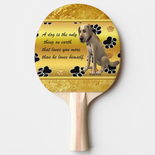 Adorable dog sitting with a cute fun quote ping pong paddle