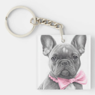 Adorable french bulldog puppy with a pink bow keychain