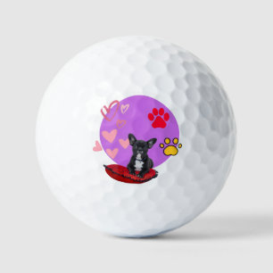 Adorable frienchie puppy with hearts golf balls