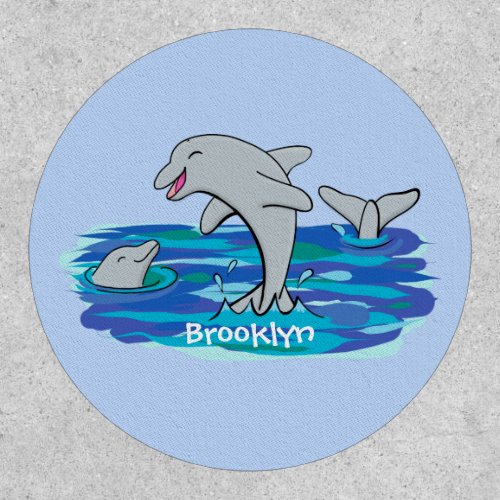 Adorable happy dolphins cartoon illustration patch