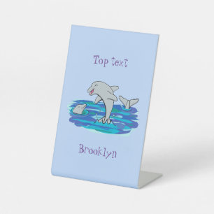 Adorable happy dolphins cartoon illustration pedestal sign
