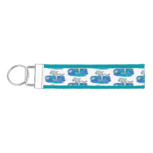 Adorable happy dolphins cartoon illustration wrist keychain