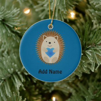Adorable Hedgehog Hugging A Blue Heart Ceramic Ornament by Egg_Tooth at Zazzle