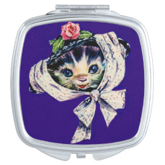 adorable kitten cat in a kitten cat hat mirror for makeup