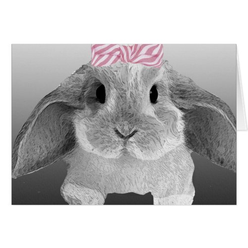 Adorable little bunny with a pink bow