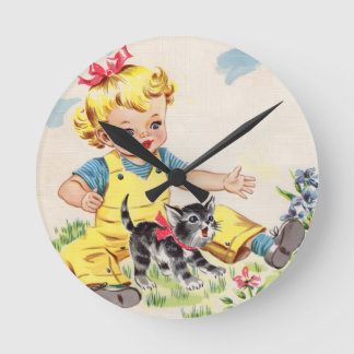 adorable little girl with adorable little kitten round clock