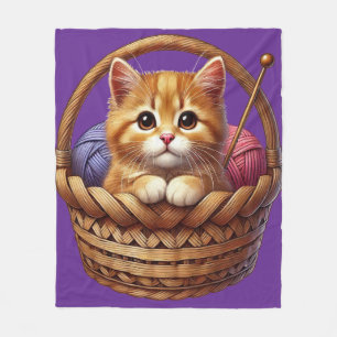 Adorable Orange Kitten in Basket With Yarn Fleece Blanket