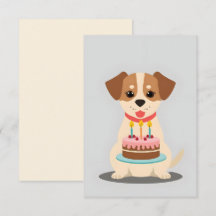 Adorable puppy with birthday cake
