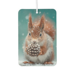 Adorable Red Squirrel in the Snow with a Pinecone Air Freshener