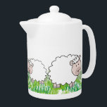 Adorable Sheep Teapot<br><div class="desc">Sheep teapot. Adorable sheep in the grass adorn this sweet little porcelain teapot. A fun gift for anyone who loves farming and sheep. Unique design and gift item for any occasion.</div>
