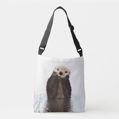 Adorable Smiling Otter in Lake Crossbody Bag