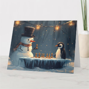 Adorable Snowman and Penguin Playing Chess Card