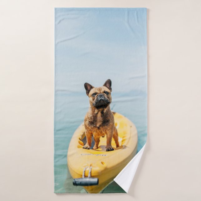 Adult brown French bulldog standing on kayak Bath Towel (Bath Towel)