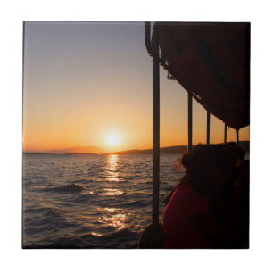 Aegean lifestyle on boat at sunset in summer ceramic tile