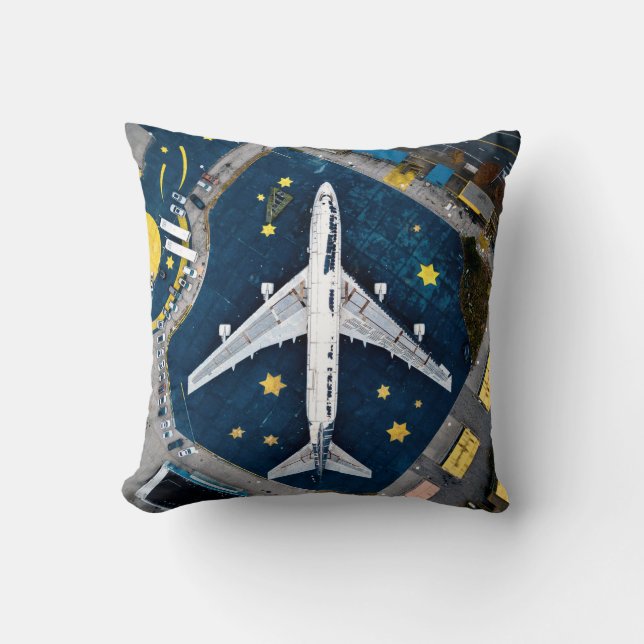 AERIAL PHOTOGRAPHY OF WHITE AND BLACK AIR LINER ON THROW PILLOW (Front)
