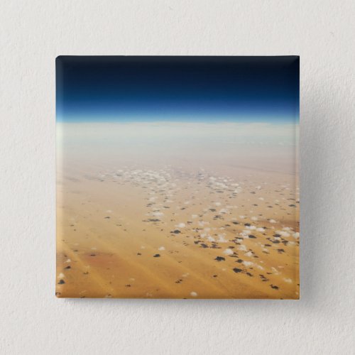 Aerial view of a desert pinback button