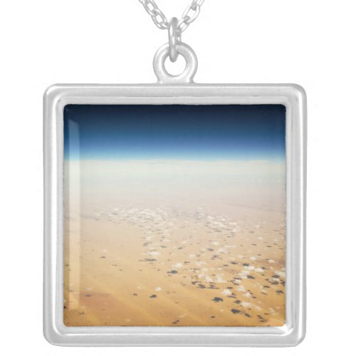 Aerial view of a desert silver plated necklace