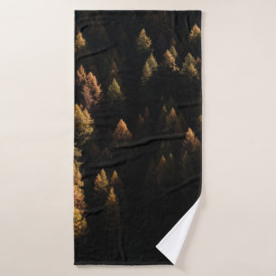 Aerial view of pine trees bath towel