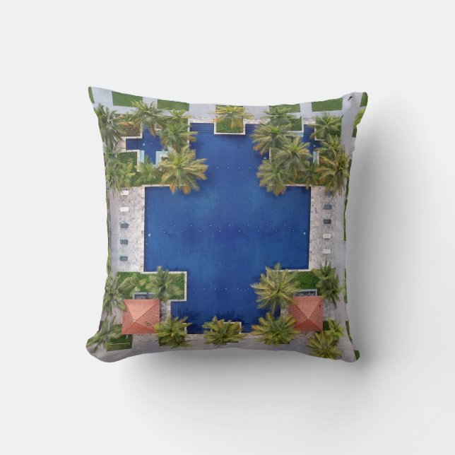 Aerial view of pool surrounded by palm trees throw pillow (Front)