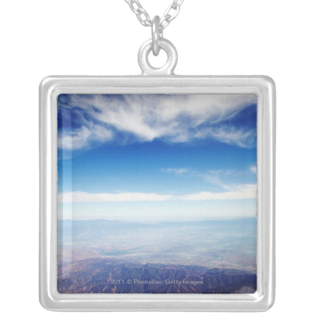 Aerial view of red brown mountains silver plated necklace (Front)