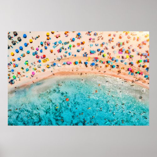 Aerial view of sandy beach with colorful umbrellas poster