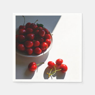 Aesthetic still life with ripe cherries on a white napkins
