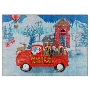 Afghan Hounds Dog in Christmas Delivery Truck Snow Cutting Board