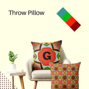 African-inspired design in green, red and yellow throw pillow