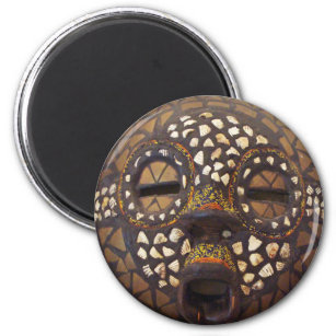 African mask with cowrie shells magnet