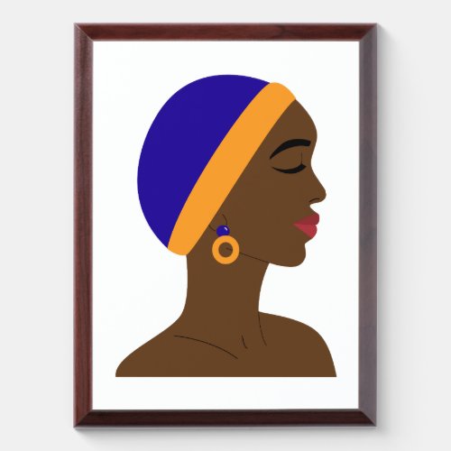 African woman in profile with blue and yellow cap award plaque