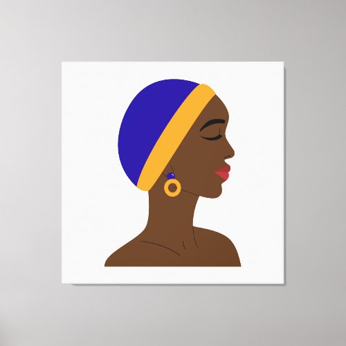 African woman in profile with blue and yellow cap canvas print