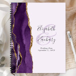 Agate Geode Purple Gold Lavender Wedding Plans Planner<br><div class="desc">This elegant modern wedding planner features a purple watercolor design trimmed with faux gold glitter. Easily customize the charcoal gray text on a pale lavender background, with the names of the bride and groom in handwriting calligraphy over a large ampersand. Add the title and wedding date below in italics. The...</div>