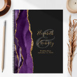 Agate Geode Script Purple Gold Dark Wedding Plans Planner<br><div class="desc">This elegant modern wedding planner features a purple watercolor design trimmed with faux gold glitter. Easily customize the gold-colored text on an off-black background, with the names of the bride and groom in handwriting calligraphy over a large gray ampersand. Add the title and wedding date below in italics. The back...</div>
