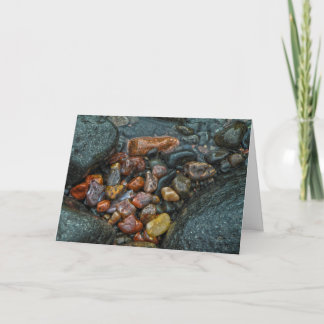 Agate rocks on the shore greeting card. card