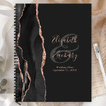 Agate Script Black Rose Gold Dark Wedding Plans Planner<br><div class="desc">This elegant modern wedding planner features a black watercolor design trimmed with faux rose gold glitter. Easily customize the rose pink text on an off-black background, with the names of the bride and groom in handwriting calligraphy over a large, charcoal gray ampersand. Add the title and wedding date below in...</div>