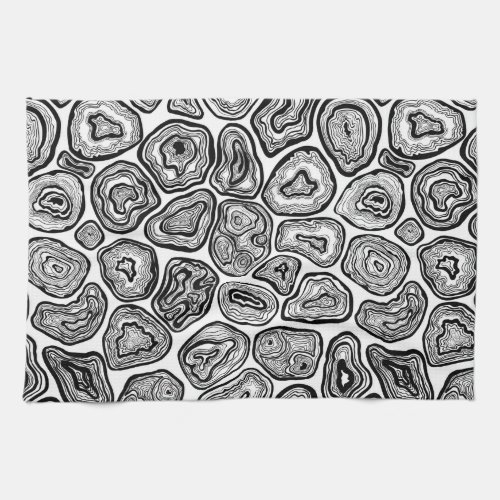 Agate slices in black and white kitchen towel