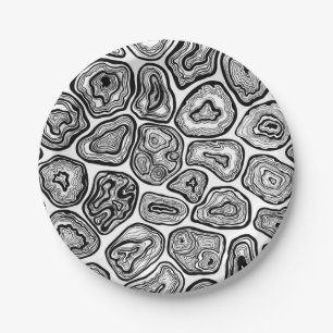 Agate slices in black and white paper plates