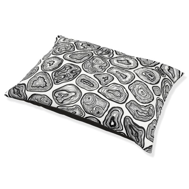 Agate slices in black and white pet bed (Angled)
