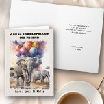 Age is Irrelephant Elephants Funny Birthday Card<br><div class="desc">Funny birthday card lettered with elephant themed play on words "age is irrelephant". You can personalize the card front and the message inside. Design features watercolor illustration of elephants on the savannah with colorful birthday balloons drifting into the sky. Fun card with light-hearted, age related humor for friend or relative...</div>