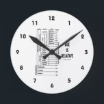 Age Is Relative (Geological Time Chart) Round Clock<br><div class="desc">No need to be a geologist or earth scientist to enjoy wry ageless humor with this clock featuring a chart of eons,  epochs,  and periods along with the saying "Age Is Relative".  Timeless scientific geek humor clock for anyone who knows about Earth's geological ages!</div>
