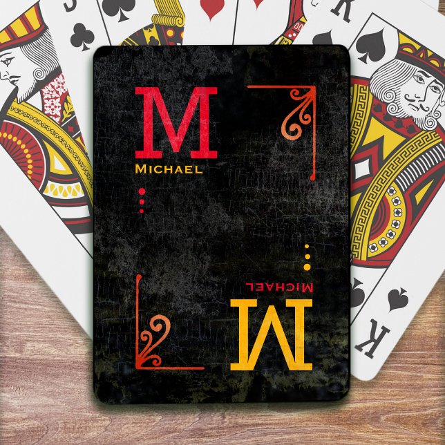 aged black monogrammed deck of poker cards (Creator Uploaded)