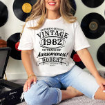 Aged To Perfection Personalized Vintage Birthday T-Shirt<br><div class="desc">Celebrate milestone birthdays with style and humor in our Aged to Perfection Personalized Vintage Birthday T-Shirt. Designed for whiskey-themed birthday parties, this shirt features a classic vintage look that resonates with timeless charm. Whether you're marking a 30th, 40th, 50th, or any special year, the "Aged to Perfection" motif captures the...</div>